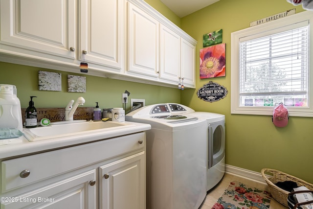 15018 Forest Oaks Dr, Louisville, KY 40245 - washroom with independent washer and dryer, cabinet space, and light tile patterned floors