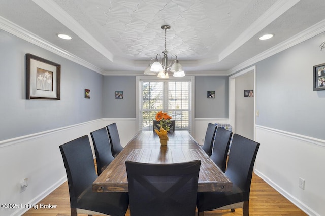 236 Running Creek Dr, Shepherdsville, KY 40165 - dining room with a raised ceiling, a chandelier, wood finished floors, crown molding, and recessed lighting