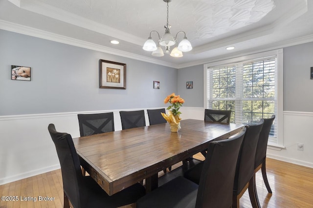 236 Running Creek Dr, Shepherdsville, KY 40165 - dining area with a tray ceiling, a chandelier, light wood finished floors, ornamental molding, and recessed lighting