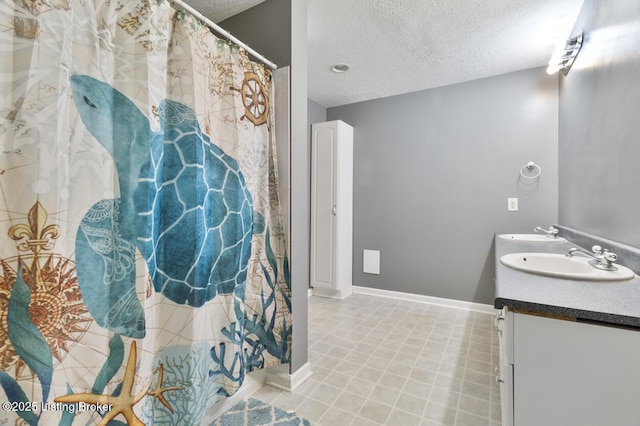 236 Running Creek Dr, Shepherdsville, KY 40165 - full bathroom featuring a textured ceiling and double vanity