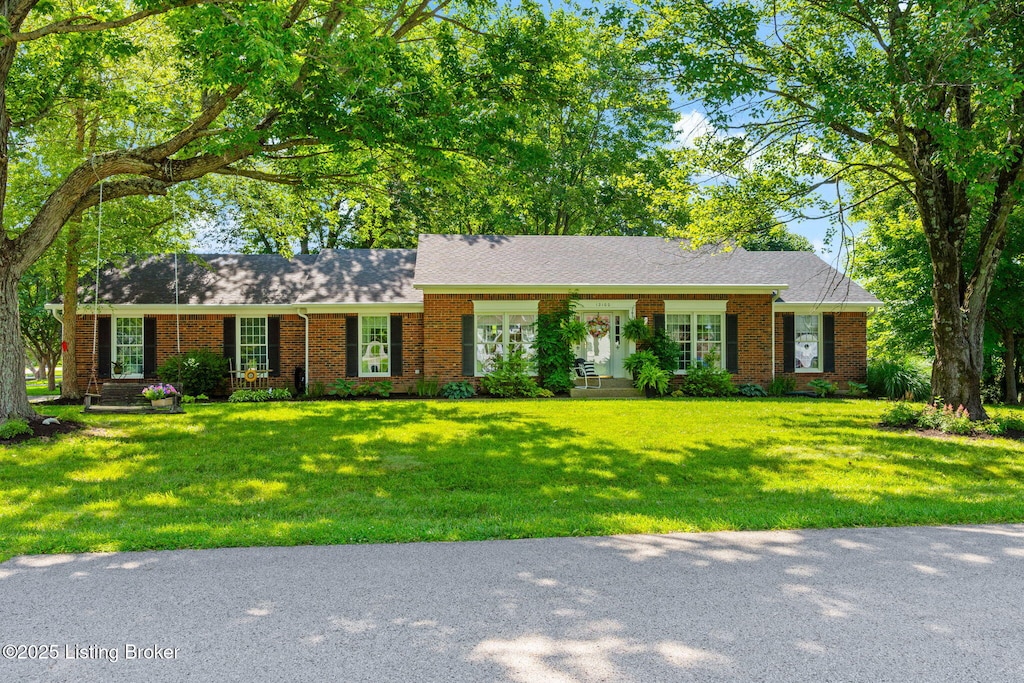 12100 Maplewood Rd, Goshen, KY 40026 - ranch-style home with a front yard and brick siding
