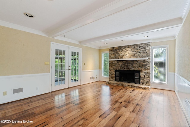 163 Ridgewood Dr, Pewee Valley, KY 40056 - unfurnished living room featuring beam ceiling, hardwood / wood-style flooring, a wainscoted wall, ornamental molding, and french doors
