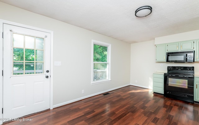 517 Oak Leaf Dr, La Grange, KY 40031 - kitchen featuring black appliances, green cabinets, dark wood-type flooring, light countertops, and a textured ceiling