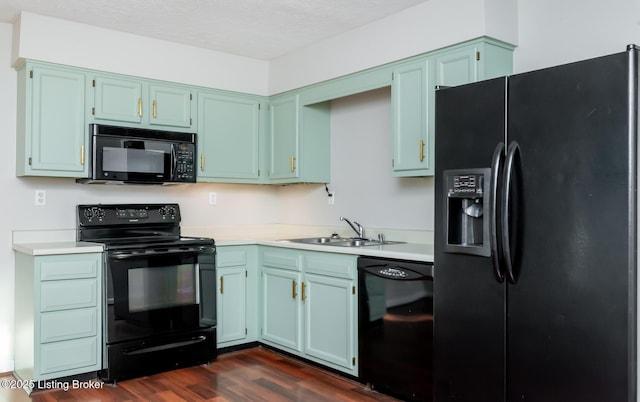 517 Oak Leaf Dr, La Grange, KY 40031 - kitchen with black appliances, dark wood-style floors, light countertops, and a textured ceiling