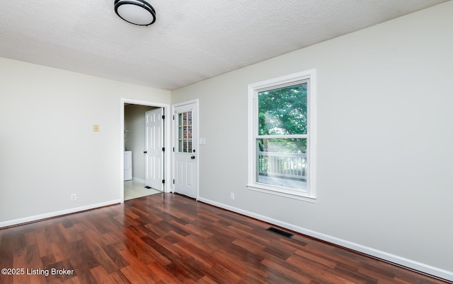 517 Oak Leaf Dr, La Grange, KY 40031 - spare room with wood finished floors and a textured ceiling