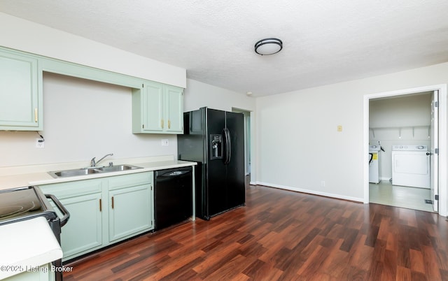 517 Oak Leaf Dr, La Grange, KY 40031 - kitchen with washer / clothes dryer, black appliances, dark wood finished floors, light countertops, and a textured ceiling