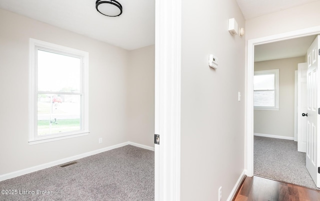 517 Oak Leaf Dr, La Grange, KY 40031 - corridor with baseboards and dark colored carpet