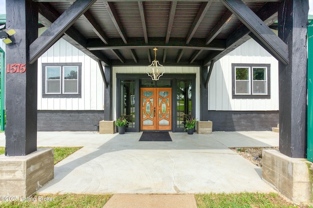 1575 Ochs Ln, Bloomfield, KY 40008 - property entrance with board and batten siding and french doors