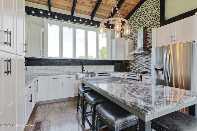 1575 Ochs Ln, Bloomfield, KY 40008 - kitchen with wall chimney exhaust hood, wooden ceiling, appliances with stainless steel finishes, a chandelier, and decorative backsplash