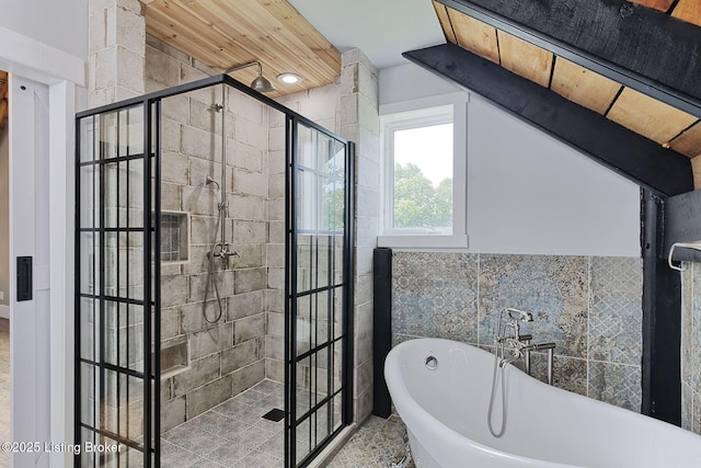 1575 Ochs Ln, Bloomfield, KY 40008 - full bathroom with a freestanding bath, a shower stall, and tile walls