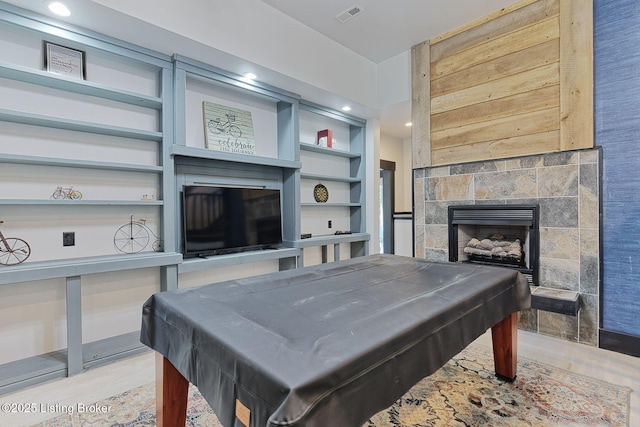 1575 Ochs Ln, Bloomfield, KY 40008 - recreation room with billiards, wood finished floors, a fireplace, and recessed lighting