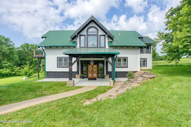 1575 Ochs Ln, Bloomfield, KY 40008 - rear view of house with a lawn, a metal roof, and french doors