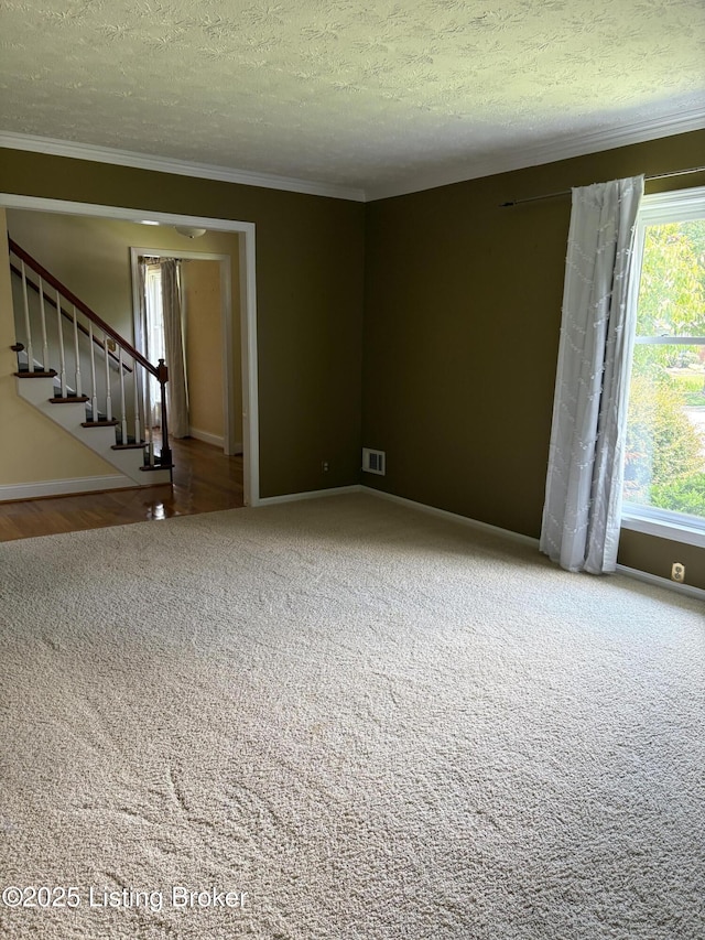 1303 Limestone Trce, Louisville, KY 40223 - carpeted empty room with crown molding, a textured ceiling, and stairway