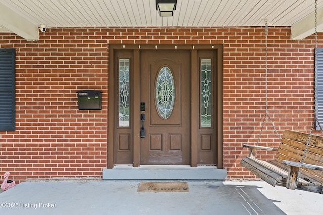 908 Chestnut Ave, Frankfort, KY 40601 - doorway to property with brick siding