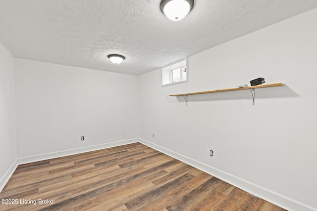 908 Chestnut Ave, Frankfort, KY 40601 - basement featuring a textured ceiling and wood finished floors