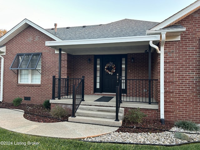 105 Waverly Dr, Bardstown, KY 40004 - doorway to property with brick siding, roof with shingles, and covered porch