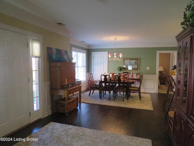 105 Waverly Dr, Bardstown, KY 40004 - dining area featuring a chandelier, dark wood-type flooring, a wainscoted wall, a decorative wall, and crown molding