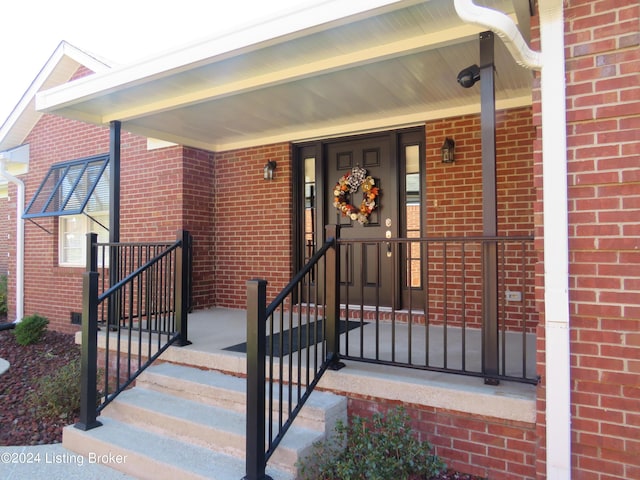 105 Waverly Dr, Bardstown, KY 40004 - property entrance featuring brick siding and a porch