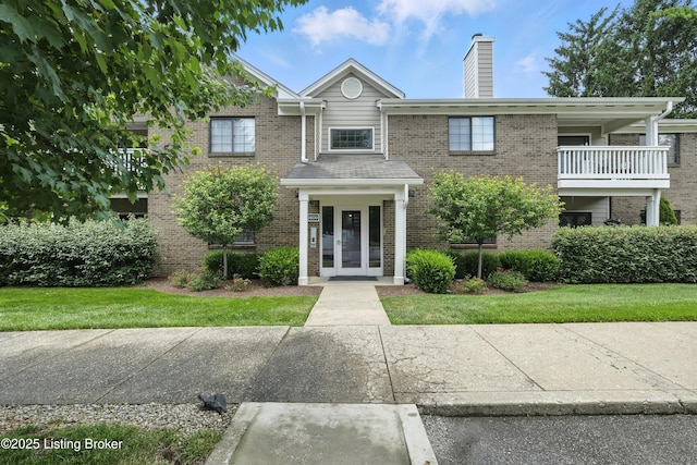 10500 Mcmeekin Ln Unit 208, Louisville, KY 40223 - multi unit property with brick siding, french doors, and a chimney