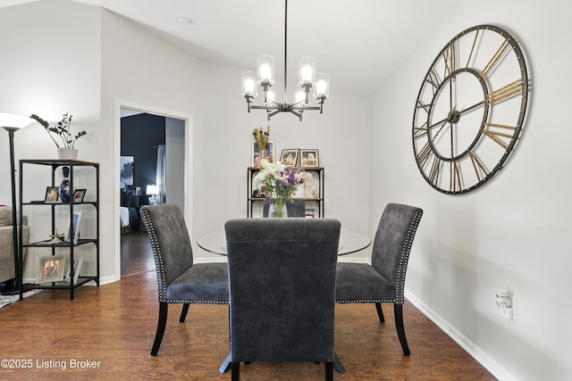 10500 Mcmeekin Ln Unit 208, Louisville, KY 40223 - dining space featuring dark wood-type flooring, a chandelier, and lofted ceiling