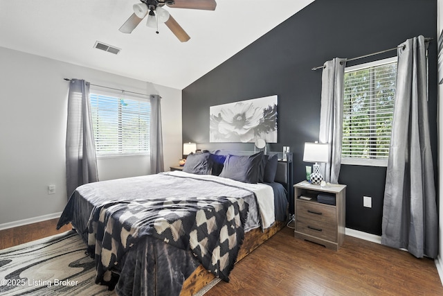 10500 Mcmeekin Ln Unit 208, Louisville, KY 40223 - bedroom with vaulted ceiling, wood finished floors, and a ceiling fan
