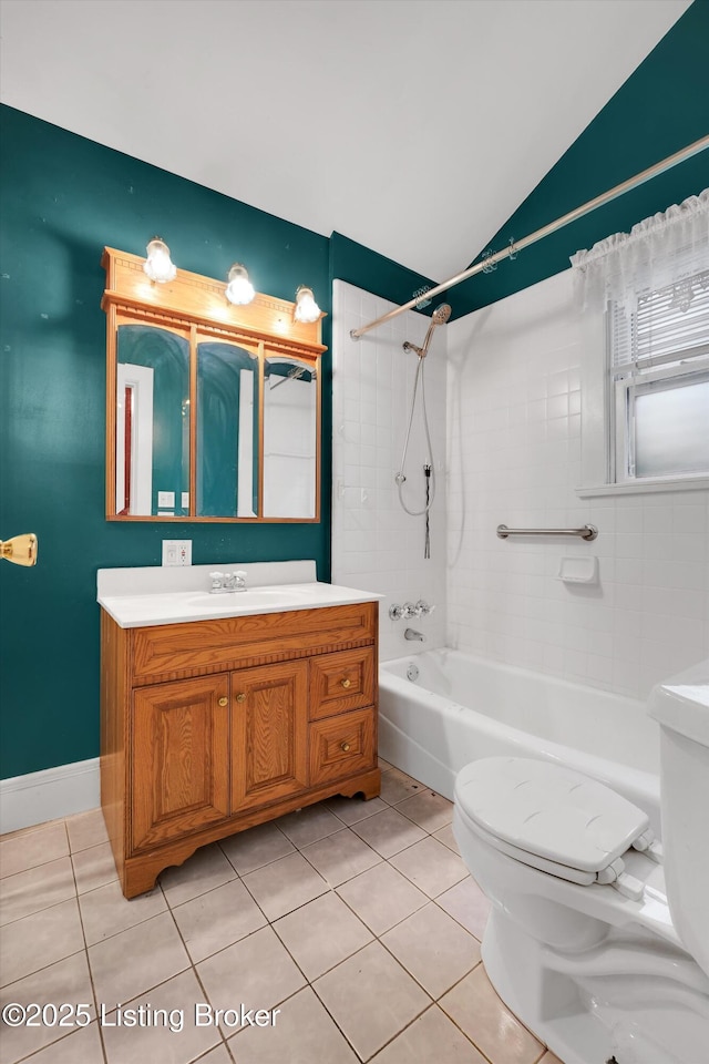 129 N Bellaire Ave, Louisville, KY 40206 - full bathroom with washtub / shower combination, tile patterned floors, vanity, and lofted ceiling