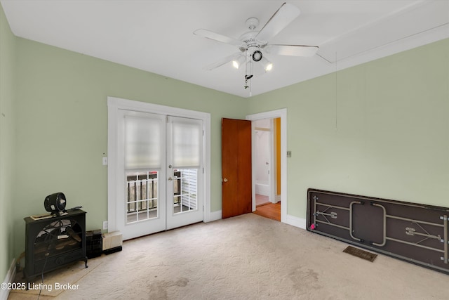 129 N Bellaire Ave, Louisville, KY 40206 - unfurnished bedroom featuring access to exterior, attic access, carpet floors, french doors, and ceiling fan