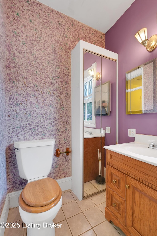 129 N Bellaire Ave, Louisville, KY 40206 - bathroom featuring vanity, wallpapered walls, and tile patterned floors