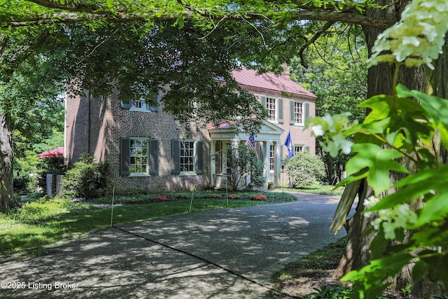 2406 Tucker Station Rd, Louisville, KY 40299 - colonial inspired home featuring brick siding