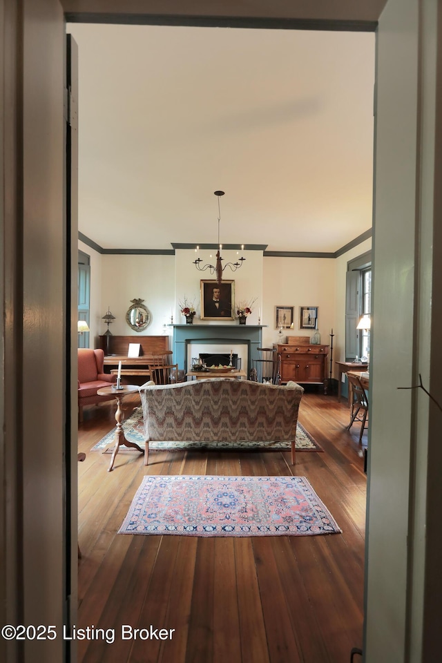 2406 Tucker Station Rd, Louisville, KY 40299 - living room featuring ornamental molding, hardwood / wood-style flooring, and a fireplace