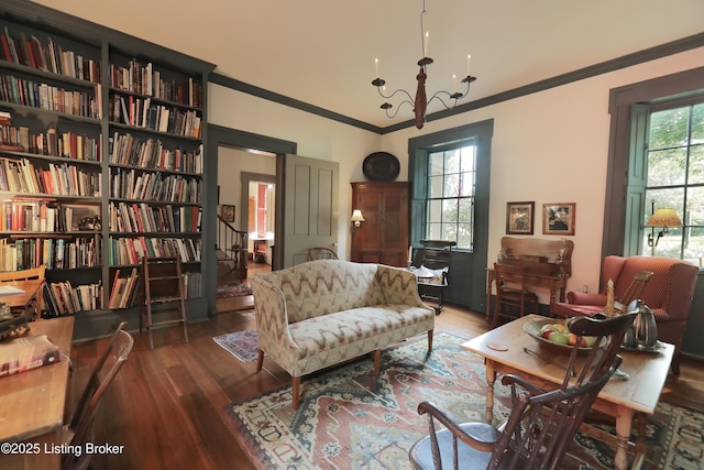 2406 Tucker Station Rd, Louisville, KY 40299 - sitting room with ornamental molding, wood finished floors, and a chandelier