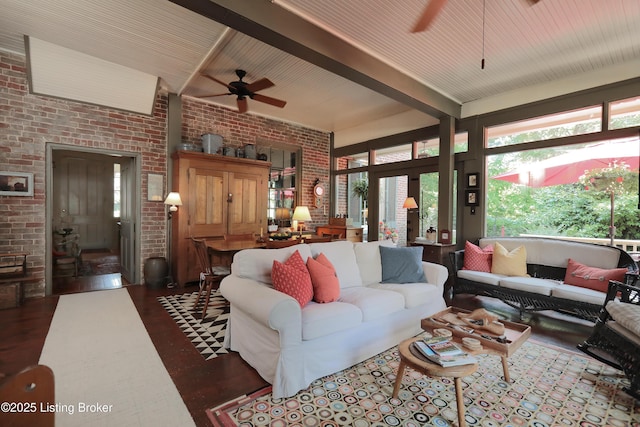2406 Tucker Station Rd, Louisville, KY 40299 - living room with a ceiling fan, brick wall, plenty of natural light, and beam ceiling