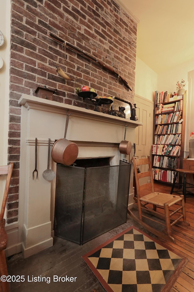 2406 Tucker Station Rd, Louisville, KY 40299 - detailed view of wood finished floors and a fireplace