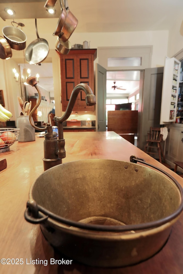 2406 Tucker Station Rd, Louisville, KY 40299 - detailed view of a sink and ceiling fan