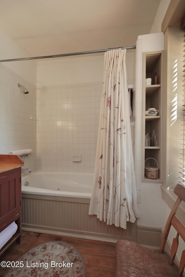 2406 Tucker Station Rd, Louisville, KY 40299 - full bath with shower / tub combo with curtain, wood finished floors, and vanity