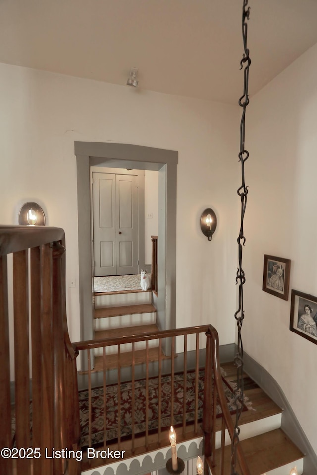 2406 Tucker Station Rd, Louisville, KY 40299 - stairs with baseboards and wood finished floors