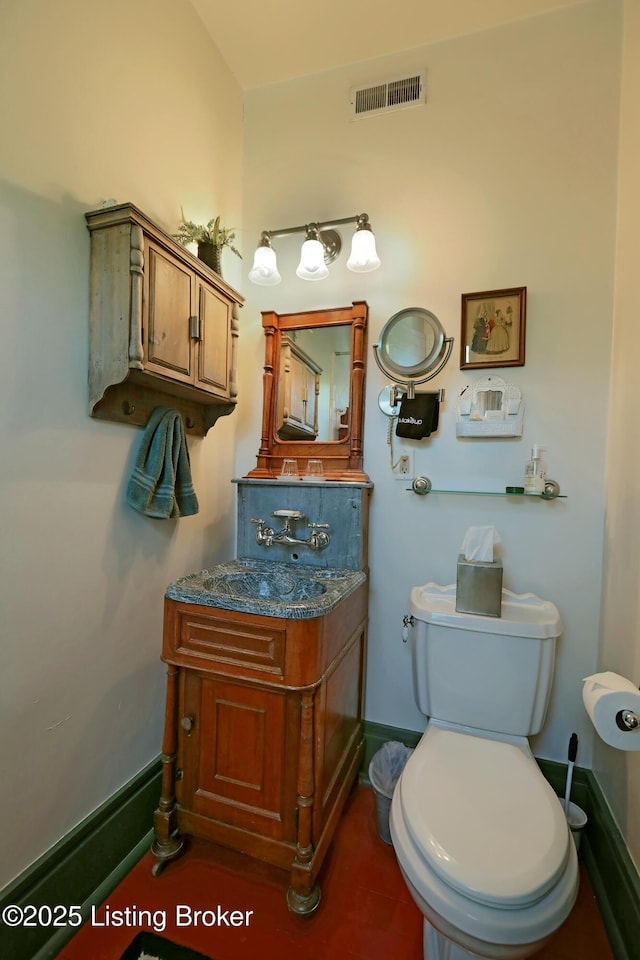 2406 Tucker Station Rd, Louisville, KY 40299 - bathroom with vanity and toilet