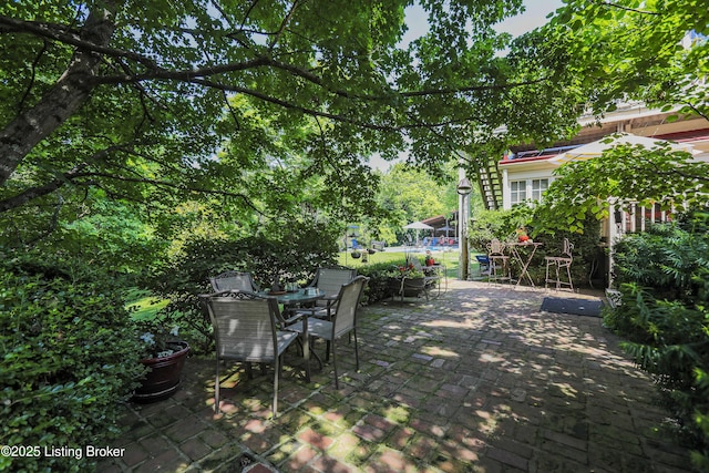 2406 Tucker Station Rd, Louisville, KY 40299 - view of patio / terrace featuring outdoor dining area