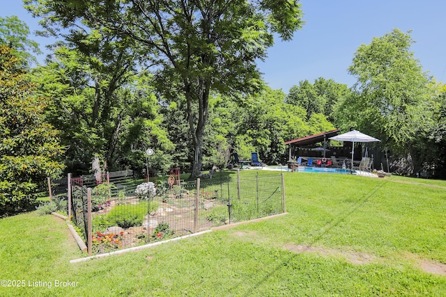 2406 Tucker Station Rd, Louisville, KY 40299 - view of green lawn featuring a garden