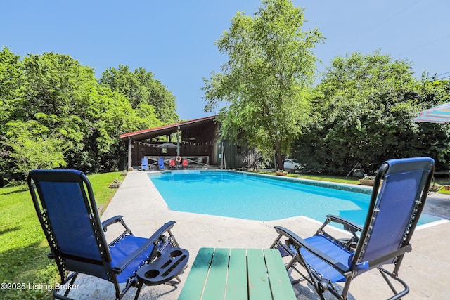 2406 Tucker Station Rd, Louisville, KY 40299 - outdoor pool featuring a patio and a lawn