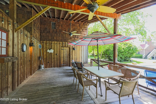 2406 Tucker Station Rd, Louisville, KY 40299 - wooden terrace with a ceiling fan and outdoor dining space