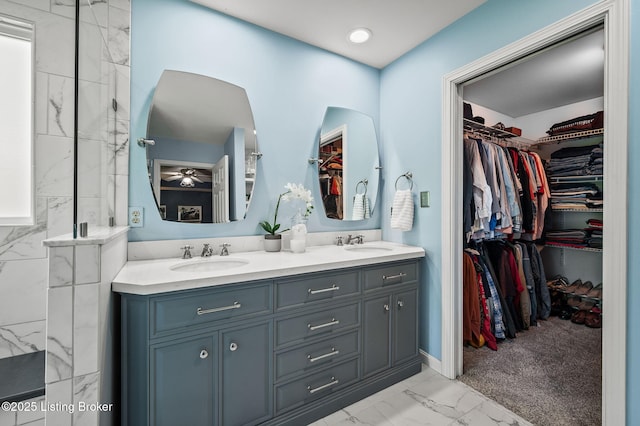 4423 Grand Cir, Crestwood, KY 40014 - full bath featuring marble look tile flooring, double vanity, and a spacious closet
