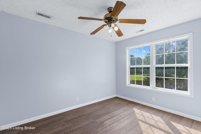 128 Clover Cove Ct, Shepherdsville, KY 40165 - empty room featuring a textured ceiling, wood finished floors, and a ceiling fan