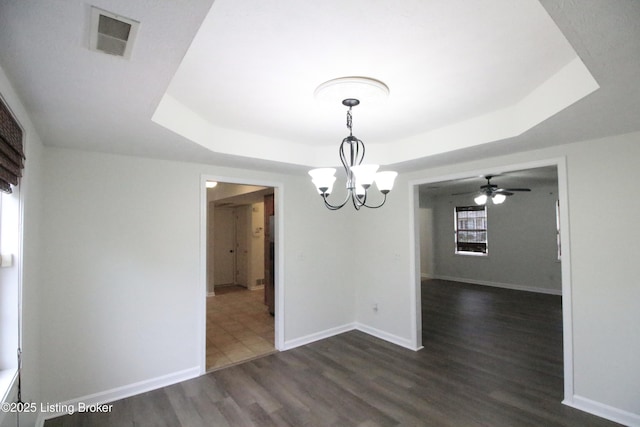 105 Wayne Way, Radcliff, KY 40160 - spare room featuring a raised ceiling, a chandelier, dark wood finished floors, and a ceiling fan