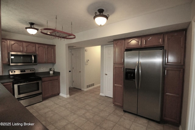 105 Wayne Way, Radcliff, KY 40160 - kitchen with stainless steel appliances and dark countertops