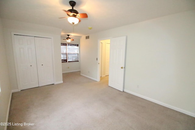 105 Wayne Way, Radcliff, KY 40160 - unfurnished bedroom with light carpet, a closet, and ceiling fan