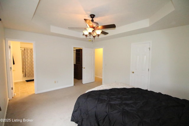 105 Wayne Way, Radcliff, KY 40160 - bedroom with a raised ceiling, light colored carpet, connected bathroom, and a spacious closet