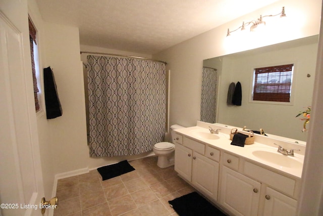 105 Wayne Way, Radcliff, KY 40160 - bathroom featuring double vanity, tile patterned floors, and curtained shower