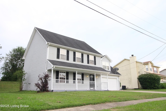 105 Wayne Way, Radcliff, KY 40160 - view of front of house with a porch, a front lawn, and a garage