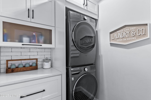 6331 Mistflower Cir, Prospect, KY 40059 - laundry room featuring cabinet space and estacked washer and dryer